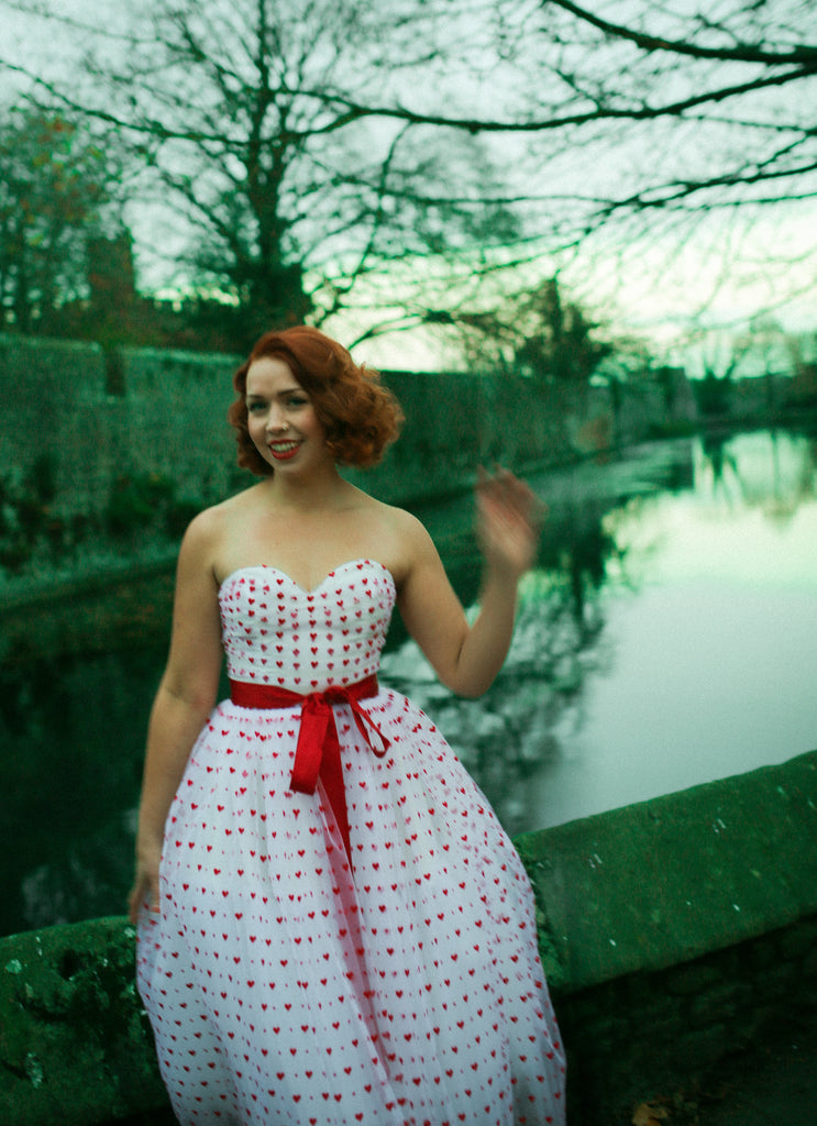 red sweet heart tulle fifties style prom dress by alexandra king 