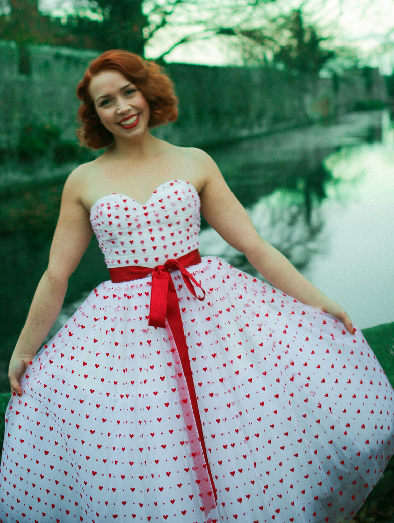 red sweet heart tulle fifties style prom dress by alexandra king 