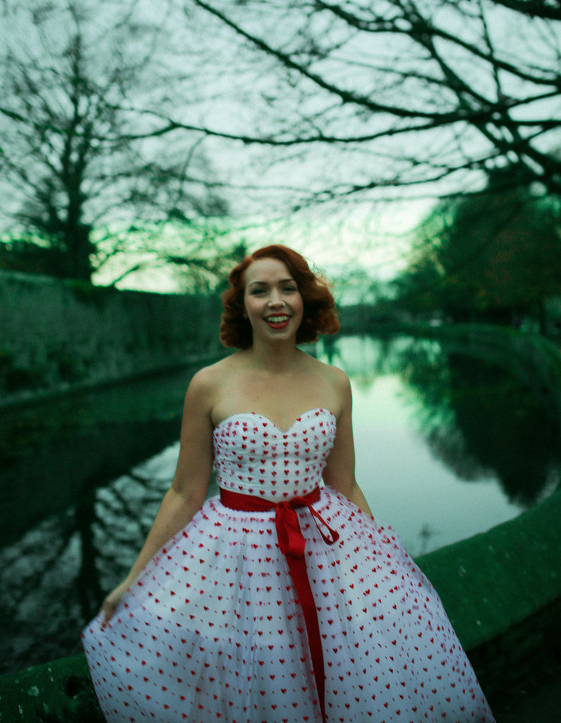 red sweet heart tulle fifties style prom dress by alexandra king 