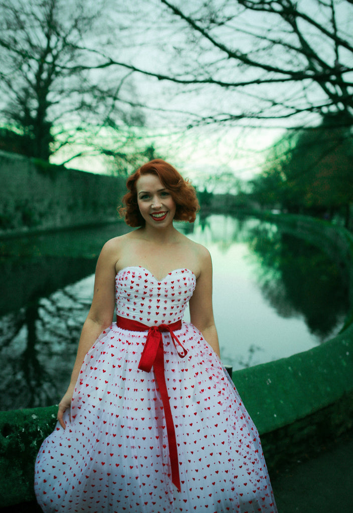 red sweet heart tulle fifties style prom dress by alexandra king 