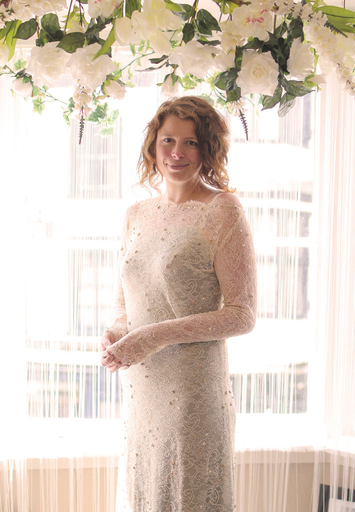 beaded gold lace long sleeve wedding dress by Alexandra King 