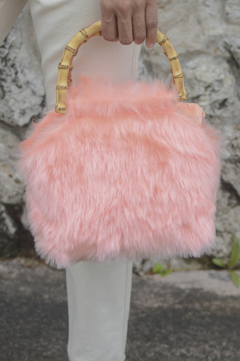 pink faux fur bag