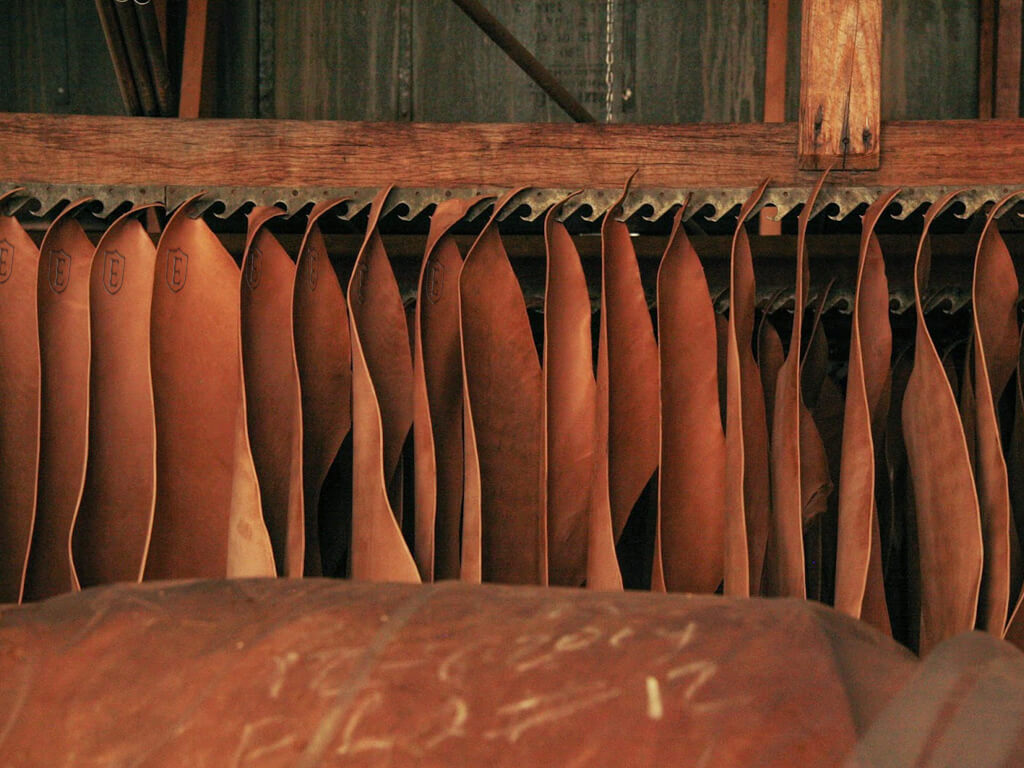 An image of rows of treated leather ready to become Ekster premium leather wallets.