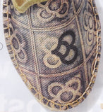 La Manual Alpargateria Barcelona panot pavement sidewalk tile design