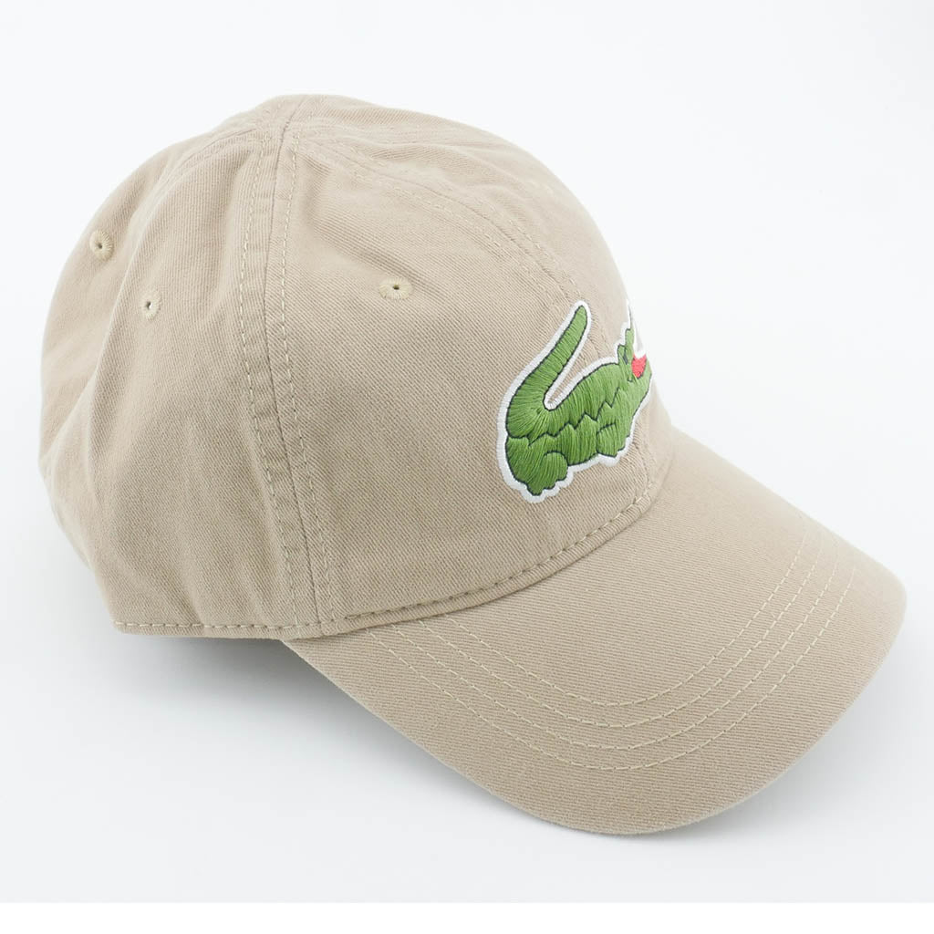 beige lacoste hat