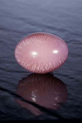 Pink conch pearls such as this fine example are very popular in the pearl trade. Those of a perfectly symmetrical shape with a pronounced flame pattern and moderate to strong saturation are the most prized. Photo credit: Robert Weldon/© GIA. Courtesy of S. Hendrickson.