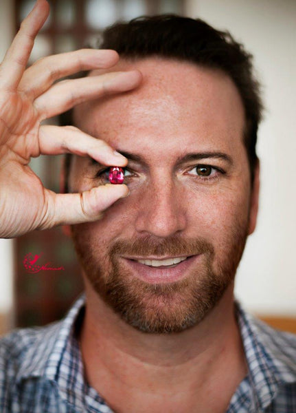 Josh Saltzman from Nomad's Holding one of their lovely pink spinels