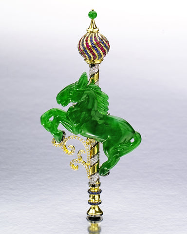 Classical horse jade carving that has been turned into a whimsical carousel brooch by Stewart Young - Photo Credit: Young Creations