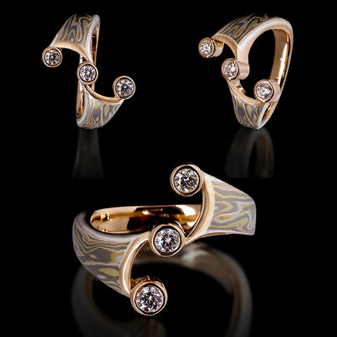 here is an example of fine assymetric jewellery ring made out of mokumegane
