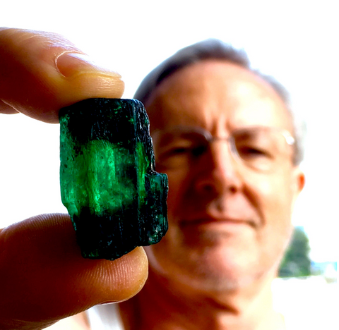 Here Jeff's holding a sizeable Ethiopian rough emerald 