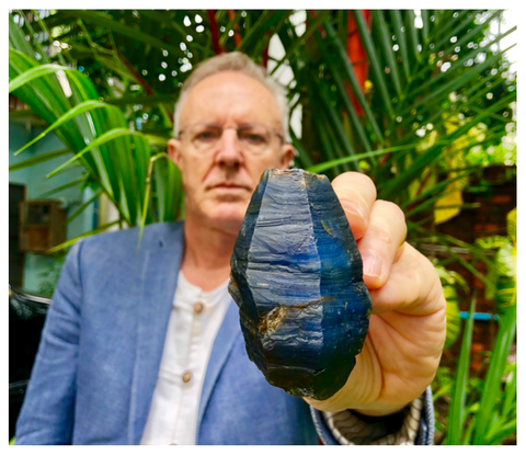 Jeff's holding a rather serious looking rough blue sapphire