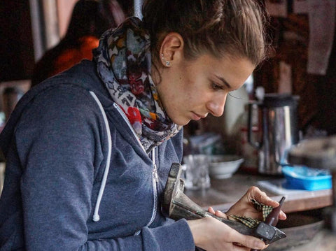 Victoria learning to cut on a traditional Burmese faceting handpiece during a field gemology trip to Mogok in 2016. Photo © Vincent Pardieu