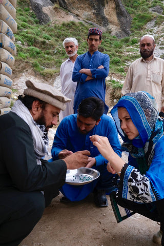 Here is Zoe Michelou inspecting a days worth of emerald production in Swat Valley, Pakistan