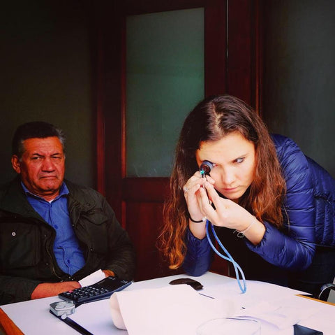 Here is Zoe Michelou looking at some fine emeralds in Colombia 