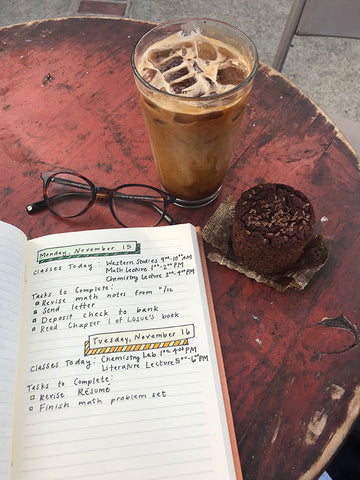 Using a bullet journal at a coffee shop