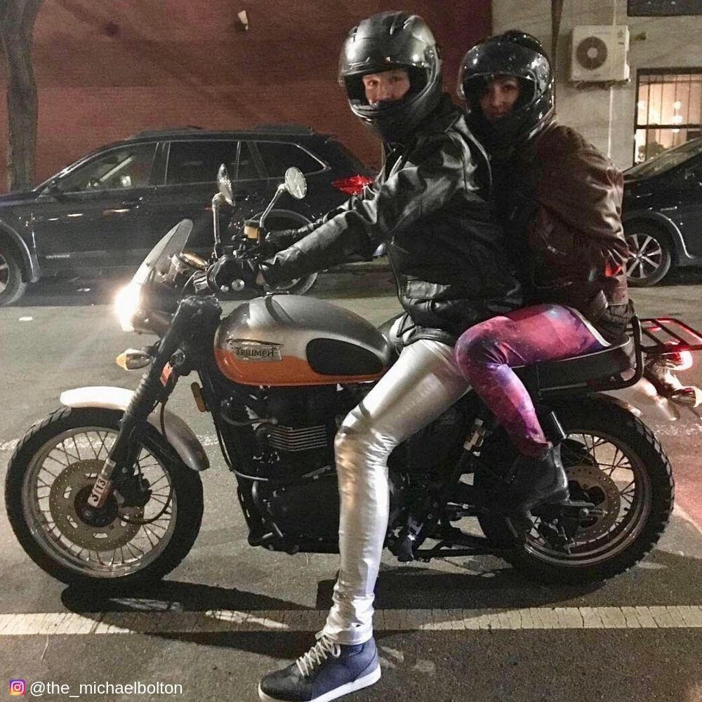 Riding a motorbike in men_s silver leggings