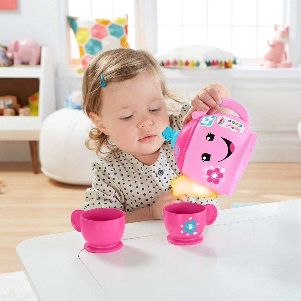 have a toddler play with a tea set