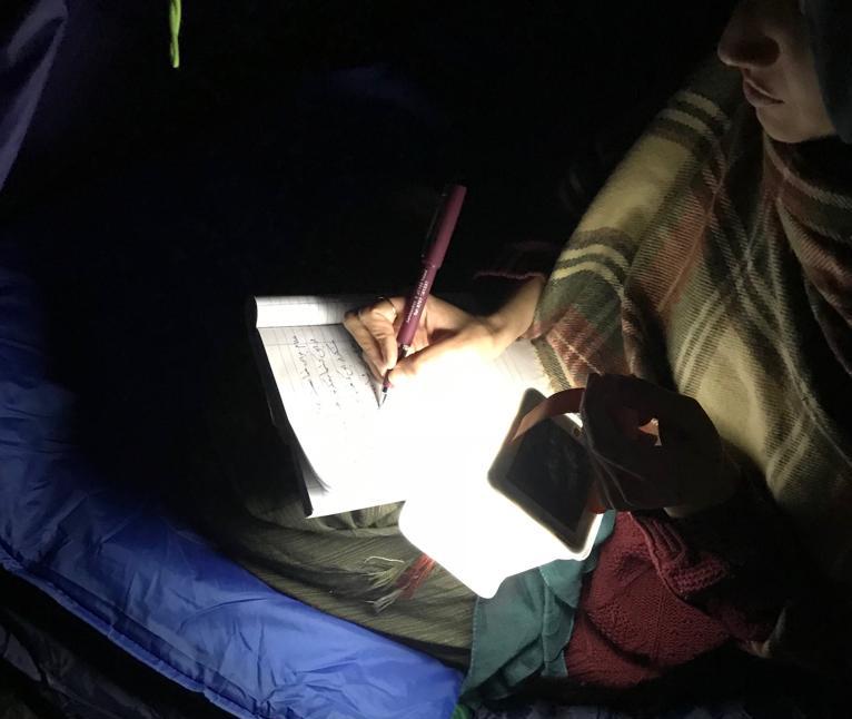 Using light to study at night.