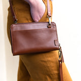 Brown leather wallet with crossbody strap by JOYN