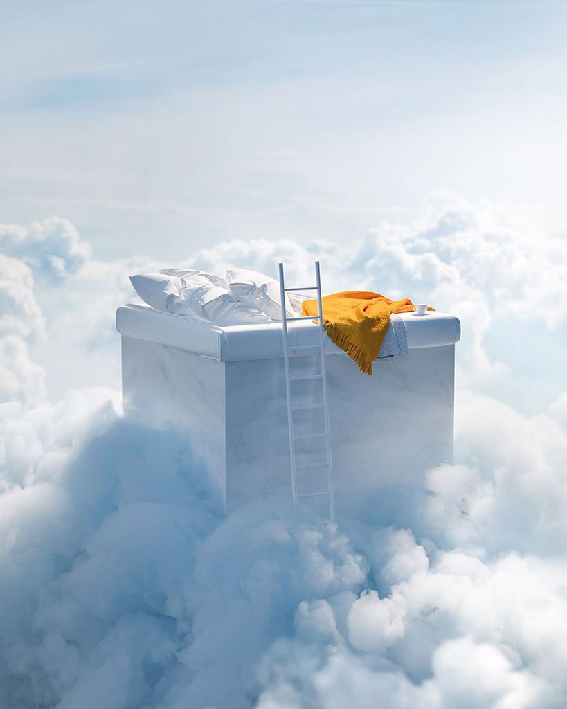 Elevated computer generated bed in the clouds with a ladder and yellow blanket.