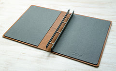 Leather portfolio with inner covers covered