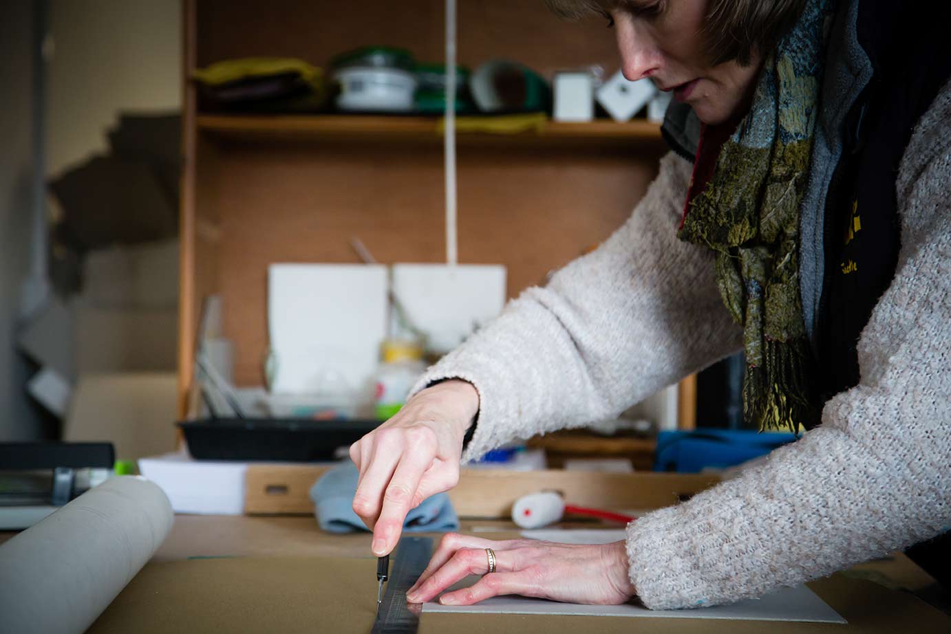 cutting out fabric for custom clamshell box