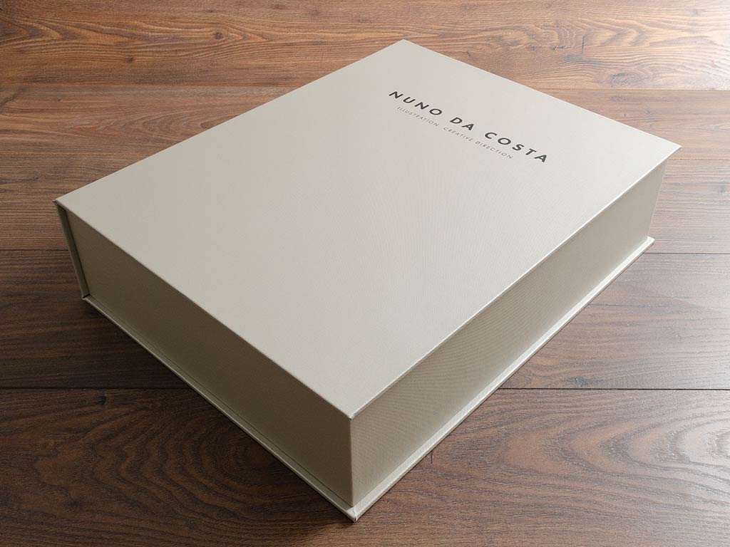 clamshell portfolio box in ivory buckram with black personalised lettering