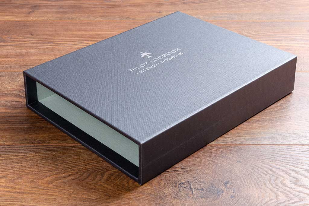 personalised and lined slipcase cover for logbook in pewter buckram