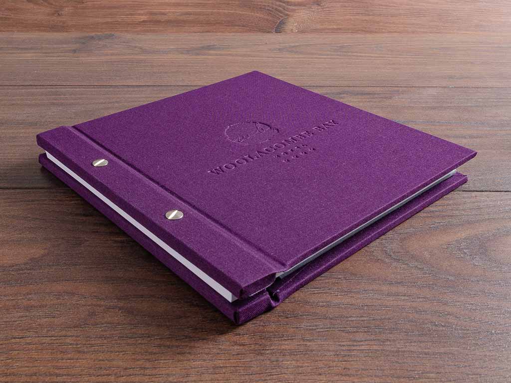 custom made luxury hotel guest book with embossed personalised cover