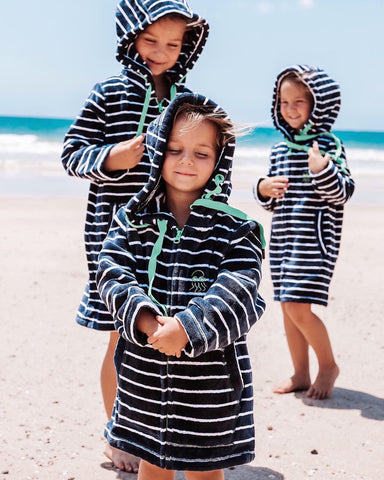 The Quinn Girls wear Swoodi hooded beach robes 