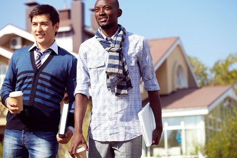 photo of two collegiate young men walking.