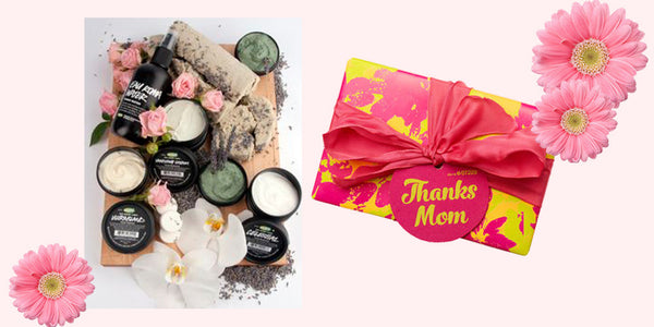 Lush's Thank Mom gift set wrapped with pink bow and pink flowers.