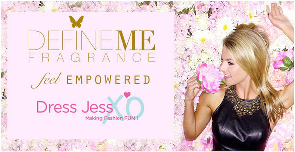 Jessica Carroll of DressJessXO lying on flowers and smelling a pink flowers.