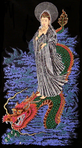 Guan Yin depicted as a sea goddess riding atop a dragon 