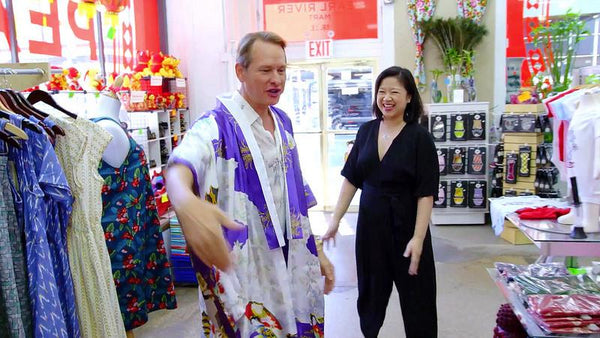 Celebrity fashion expert Carson Kressley with Pearl River president Joanne Kwong having fun in Pearl River's Tribeca store