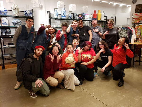 Pearl River staff and staff from Mao's Bao and Hokkaido Brewing enjoying a silly moment