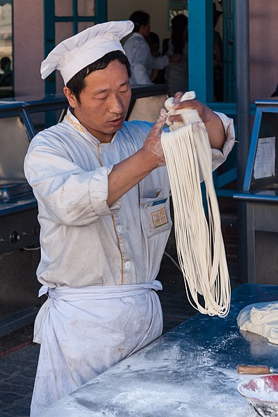 A man making lamian, or pulled noodles