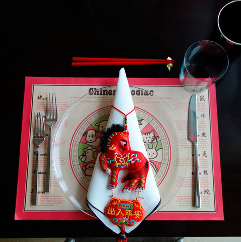 Chinese zodiac placemat with dinner setting and brocade horse