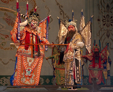 Two Chinese opera performers on stage