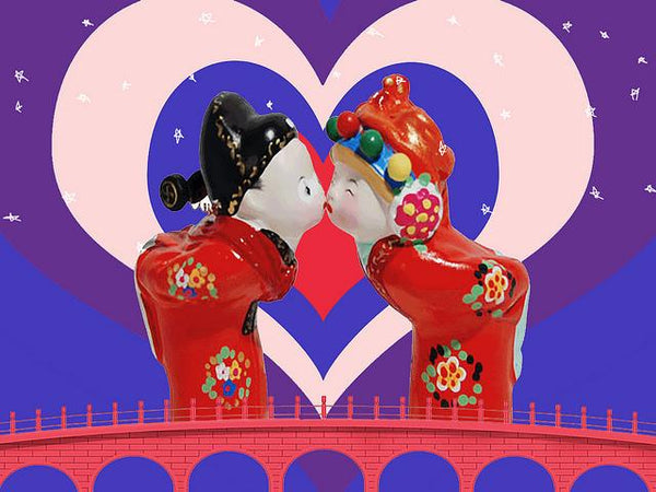 Traditional Chinese wedding dolls kissing against a heart background