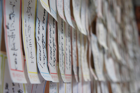 Strips of paper with people's wishes