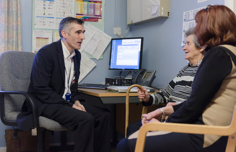 Health care professional discussing options with a patient