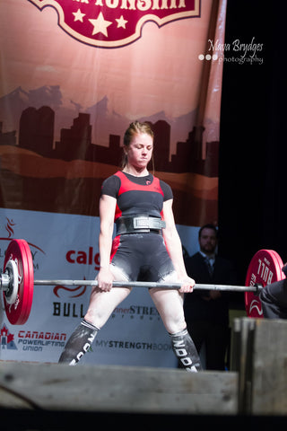 Female Powerlifter Competing