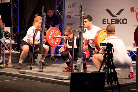 Female Powerlifter Lifting at Competition