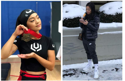 Female Powerlifter Posing with Medal