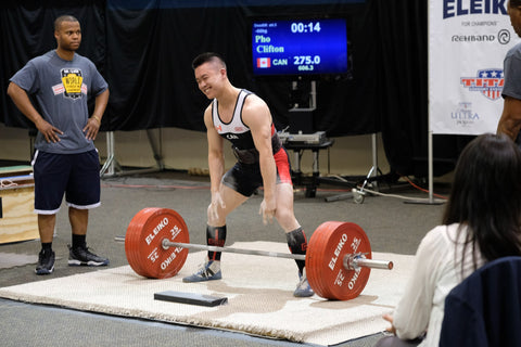 Male Powerlifter Preparing to Lift at Competition