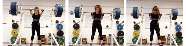 Female Powerlifter Preparing to Squat