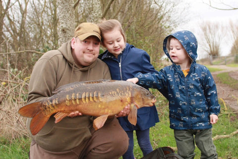 Paul with a Carp and his Children