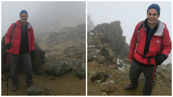 Man at the top of mountain