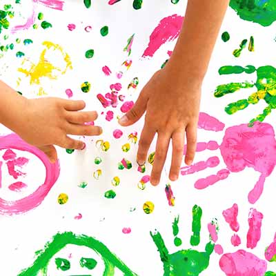 Kids handprinting with paint